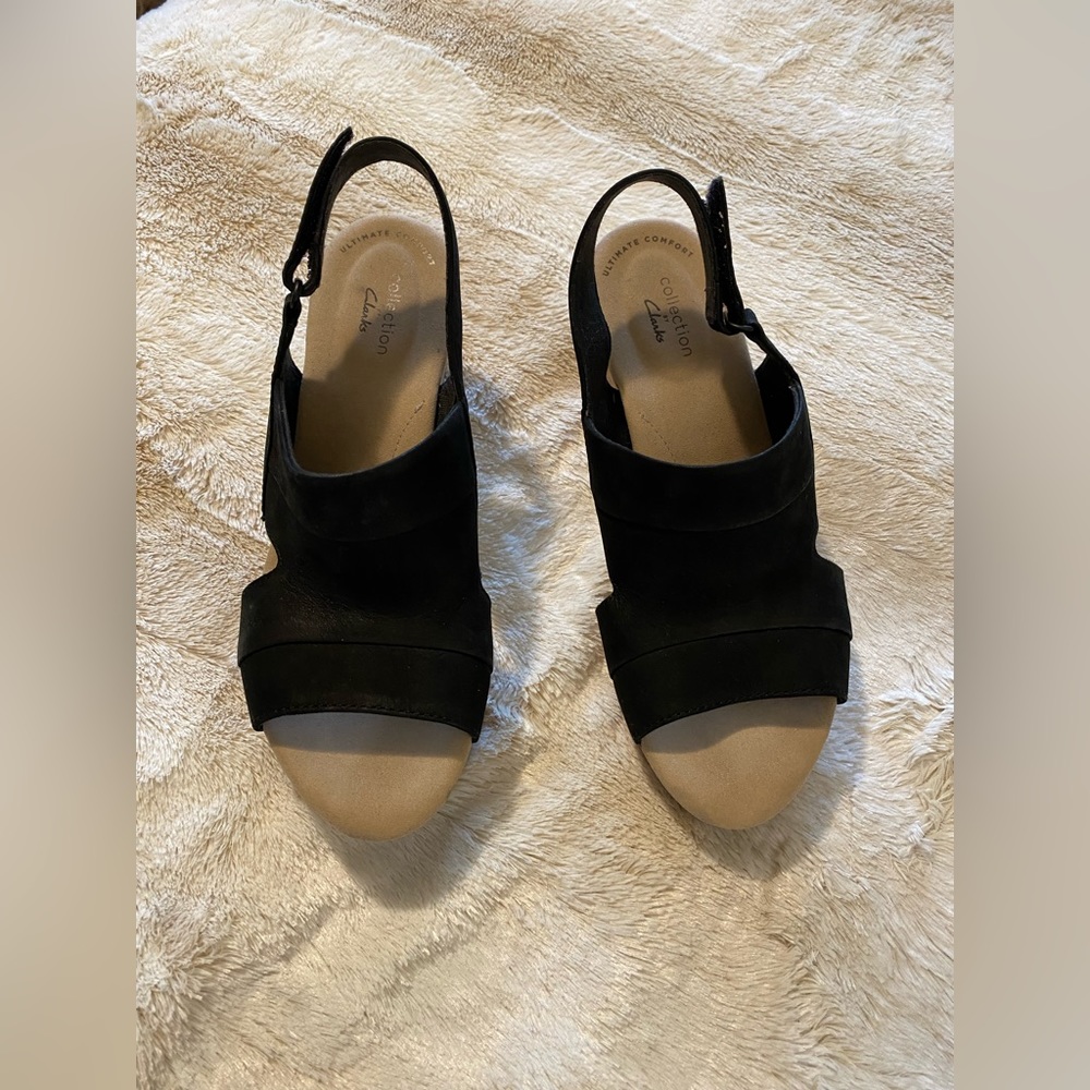 Collection by Clark’s wedges, size 8.